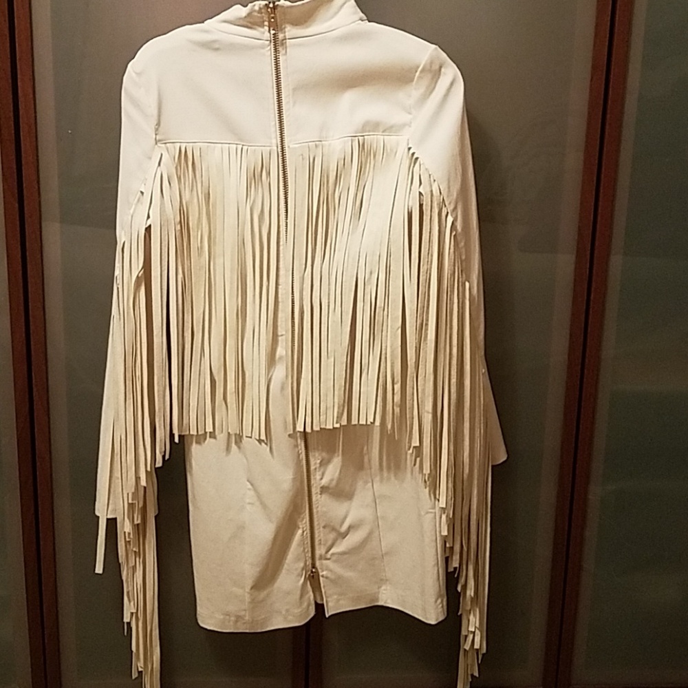 White fringe shirt dress.